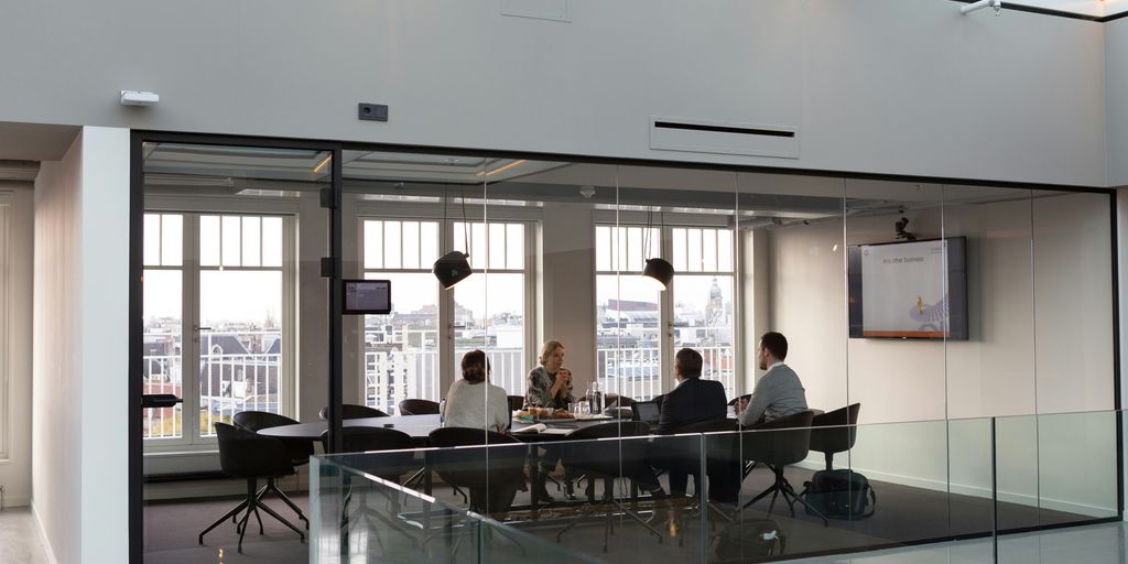 people sitting on chair inside building